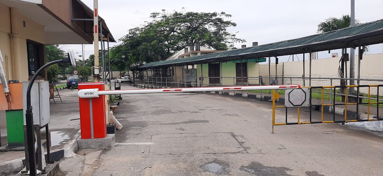 Boom barrier at a site entrance